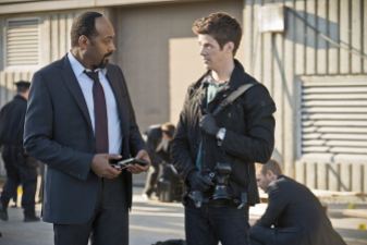 The Flash -- "Power Outage" -- Image FLA107b_0086b -- Pictured (L-R): Jesse L. Martin as Detective Joe West and Grant Gustin as Barry Allen -- Photo: Diyah Pera/The CW -- ÃÂ© 2014 The CW Network, LLC. All rights reserved.